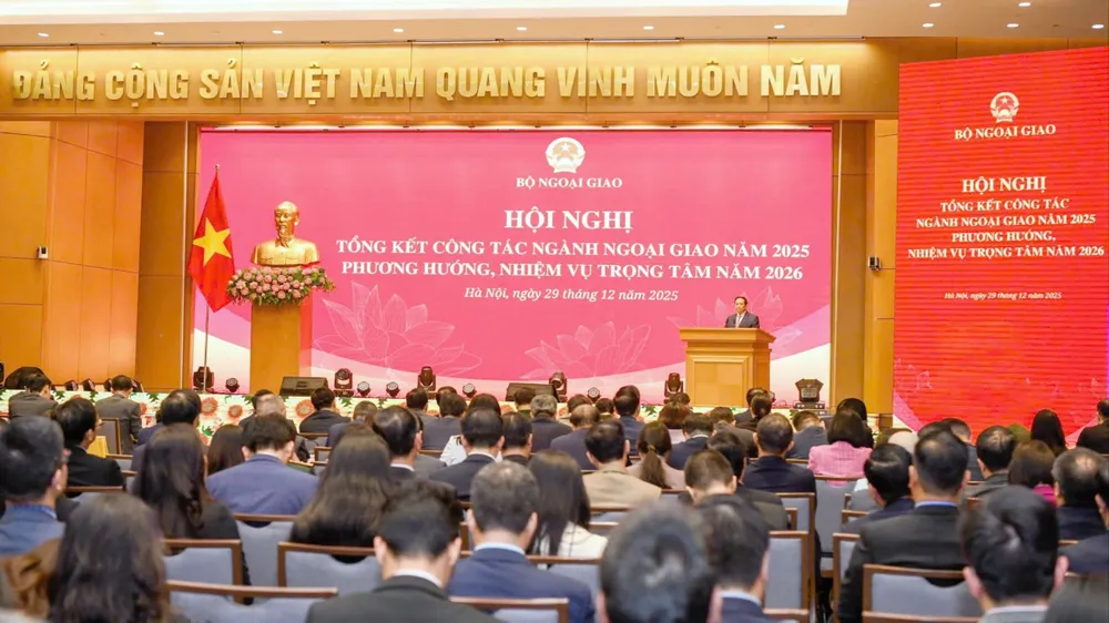 Hội nghị tổng kết công tác ngành ngoại giao năm 2025 và triển khai phương hướng, nhiệm vụ năm 2026, chiều 29-12. Ảnh: VIẾT CHUNG