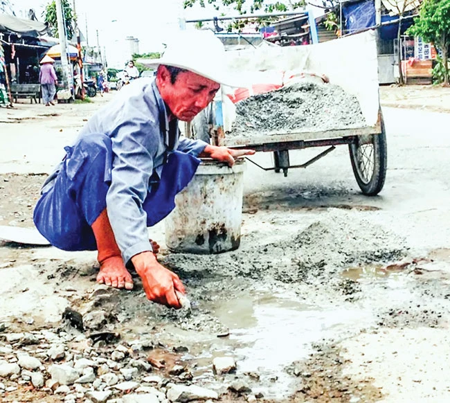 Chuyện những người vá đường ảnh 1 Chuyện những người vá đường ảnh 1