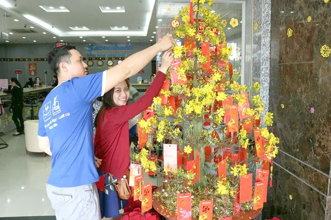 Hết Tết, xắn tay vào công việc ảnh 2 Hết Tết, xắn tay vào công việc ảnh 2