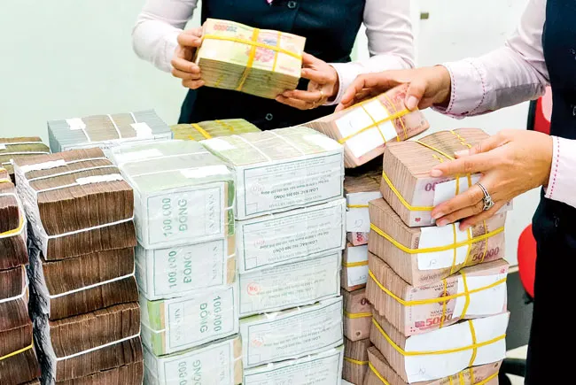 Hệ thống ngân hàng oằn lưng gánh vốn ảnh 1 Hệ thống ngân hàng oằn lưng gánh vốn ảnh 1