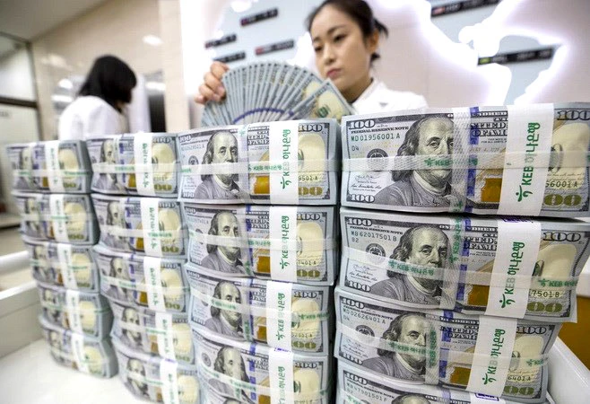Thách thức vị thế đồng USD ảnh 1 Thách thức vị thế đồng USD ảnh 1