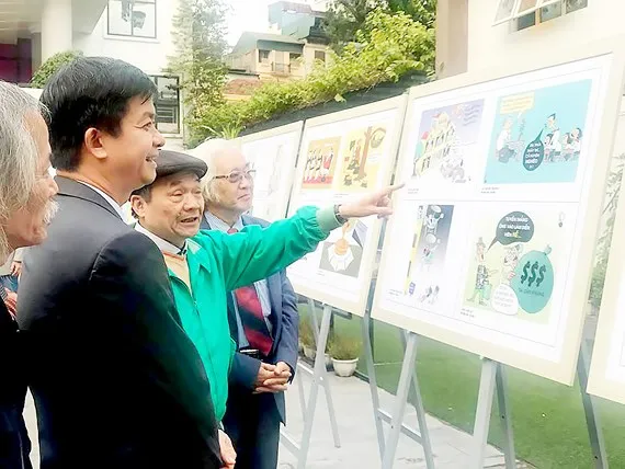 Cười ra nước mắt với biếm họa chống tham nhũng Tác phẩm Vỏ bọc của tác giả Trần Hải Nam - giải Ba