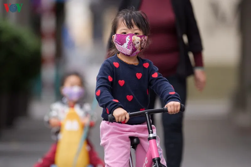 người hà nội đeo khẩu trang phòng chống covid-19, đón "rét nàng bân" hình 14 nguoi ha noi deo khau trang phong chong covid-19, don "ret nang ban" hinh 14