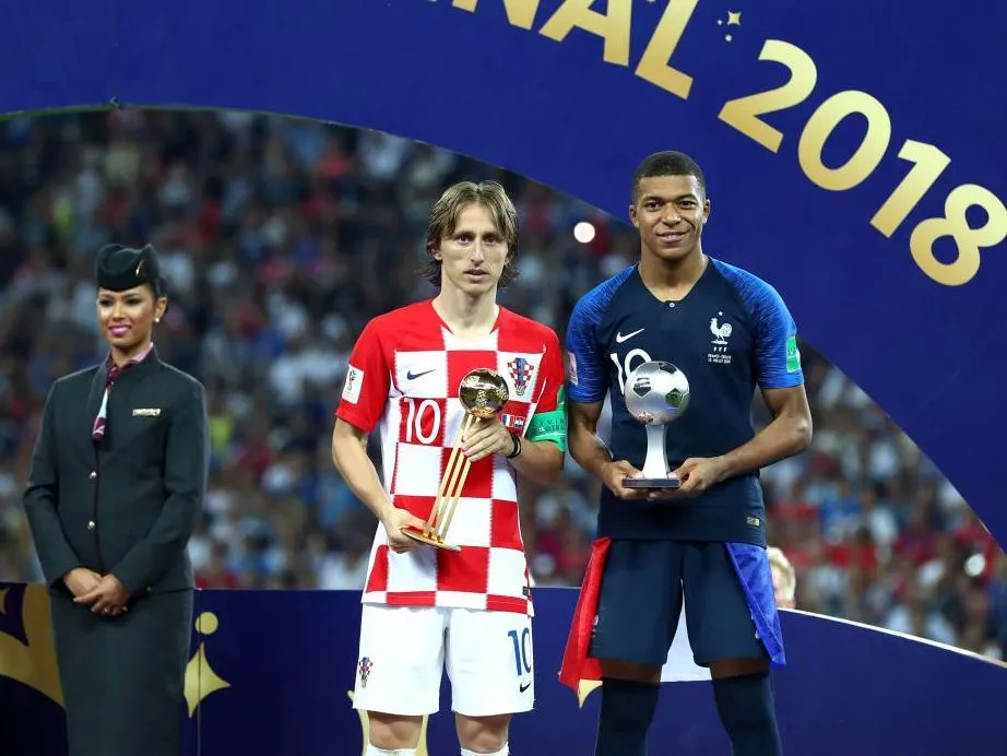 Luka Modric và Kylian Mbappe