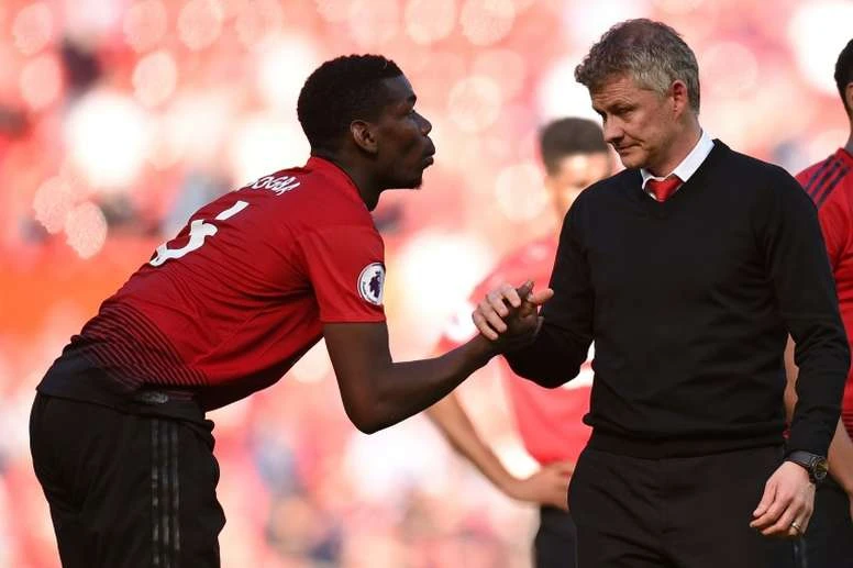 Paul Pogba và HLV Ole Gunner Solskjaer.