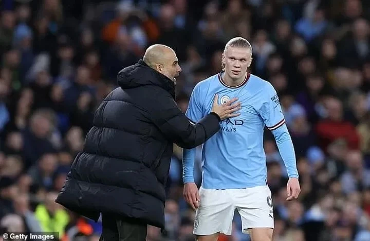 Pep Guardiola và Erling Haaland