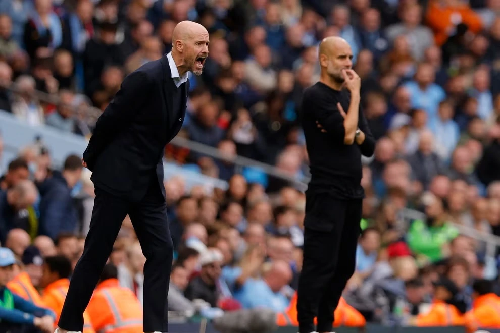 Pep Guardiola (phải) và Erik ten Hag của Man United