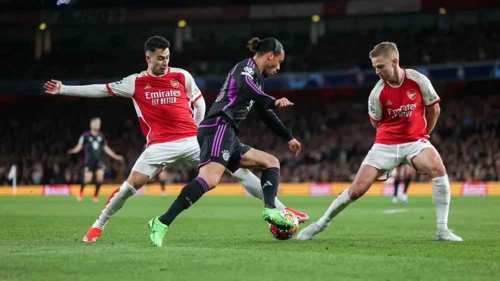 Leroy Sane với pha đi bóng xuyên thủng hàng thủ Arsenal