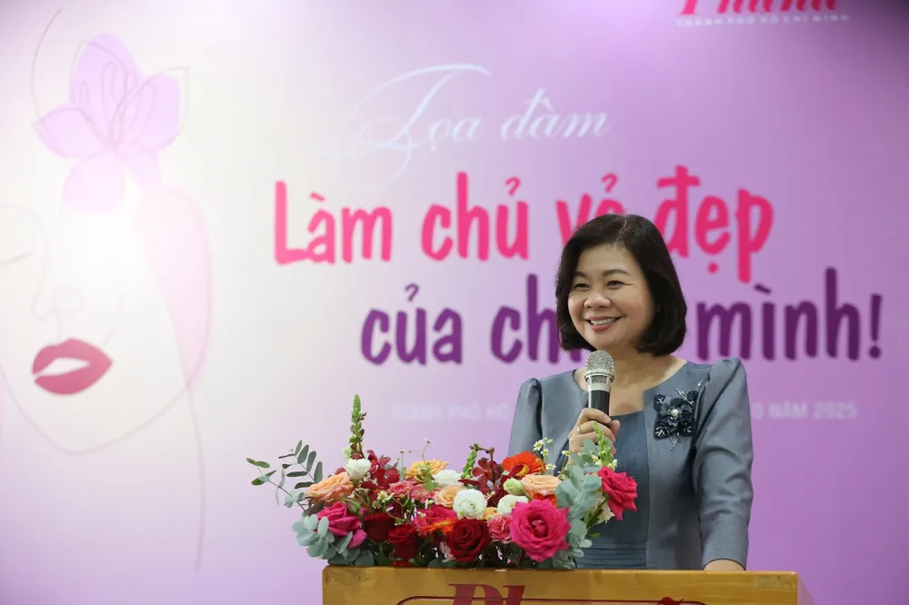 Bà Lý Việt Trung, Tổng Biên tập Báo Phụ nữ phát biểu tại tọa đàm image001.jpg