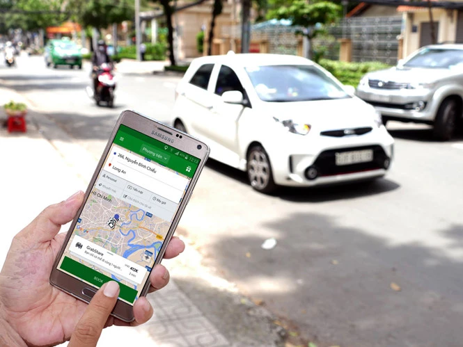 Giá taxi công nghệ Uber và Grab không còn rẻ như lúc trước