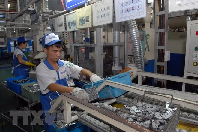 Dây chuyền sản xuất linh kiện ôtô, xe máy. (Ảnh minh họa. Danh Lam/TTXVN)