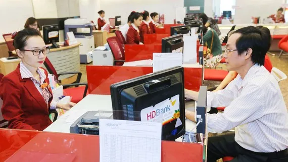 Nhiều ngân hàng tập trung vốn cho sản xuất kinh doanh dịp cuối năm nhằm đảm bảo chất lượng tín dụng. Ảnh: PHAN LÊ