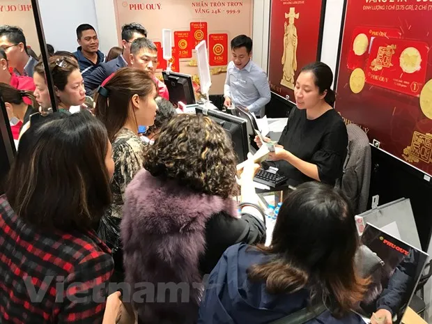 Tỷ giá trung tâm tăng mạnh, giá vàng chững lại trước ngày Thần Tài