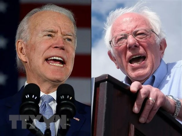 Ứng cử viên Joe Biden (trái) và Bernie Sanders. (Ảnh: AFP/ TTXVN)