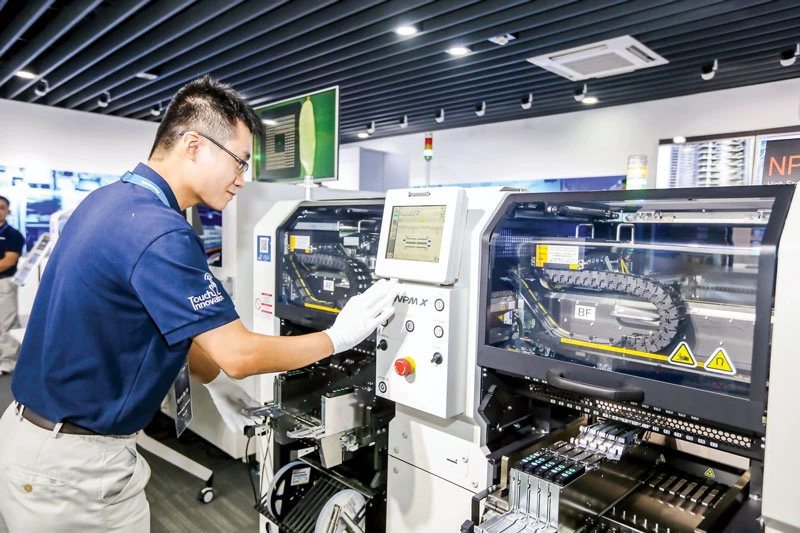 Close view of a Panasonic Vietnam production line. Photo: VIET CHUNG