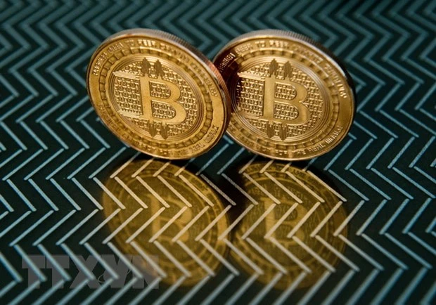 Đồng tiền kỹ thuật số bitcoin. (Ảnh: AFP/TTXVN)