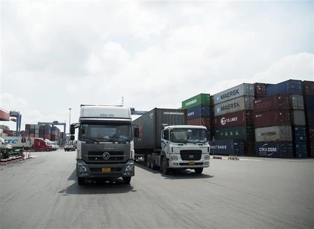 Xe container vào cảng Cát Lái. (Ảnh: Hồng Đạt/TTXVN)