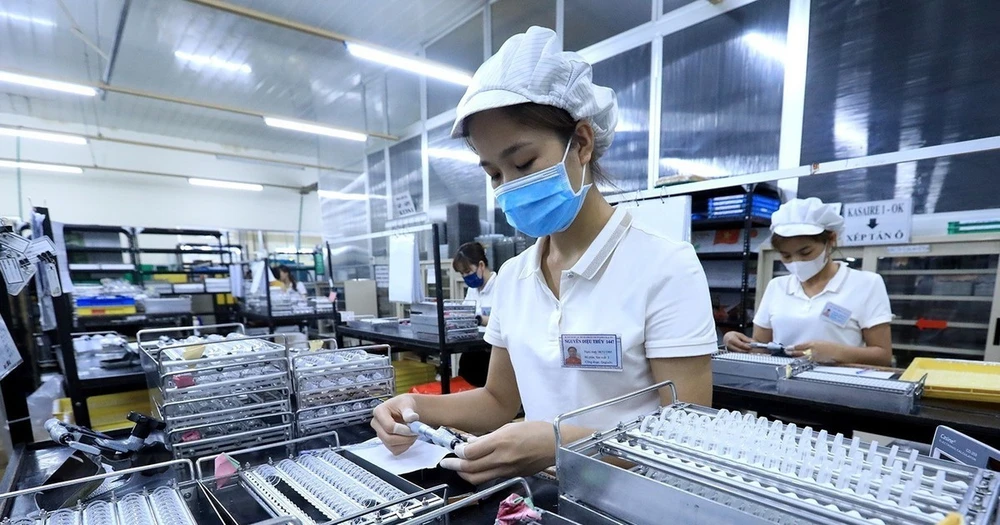 Đầu tư trực tiếp nước ngoài (FDI) trong năm ngoái đạt 36,6 tỷ USD. (Ảnh: Tuấn Anh/TTXVN)