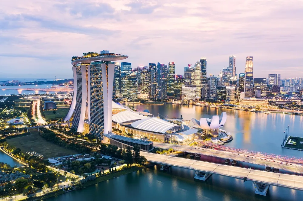 Sự trỗi dậy của Singapore, một con rồng châu Á khác cũng từ việc cải thiện, xây dựng hạ tầng quốc gia. DNTN12.jpg