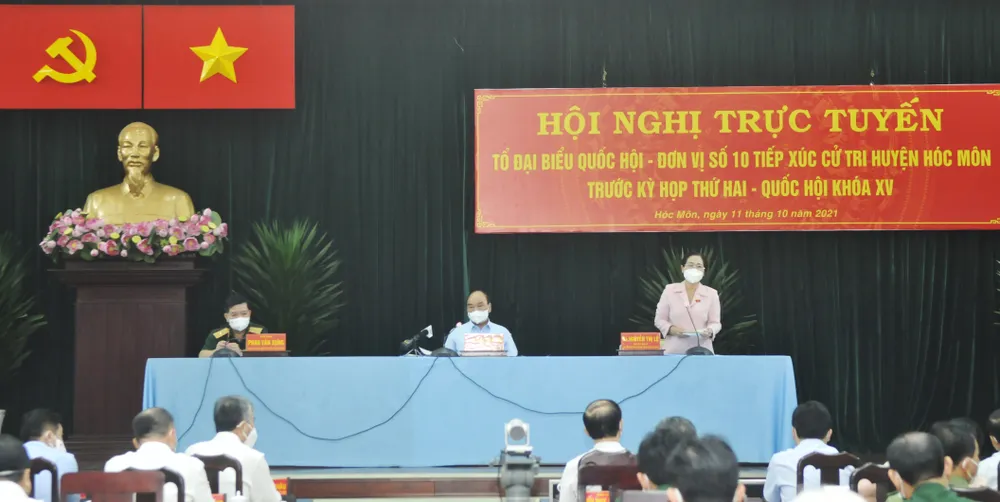 Chủ tịch nước Nguyễn Xuân Phúc: Sớm đưa huyện Hóc Môn thành đô thị phía Tây của TPHCM ảnh 1