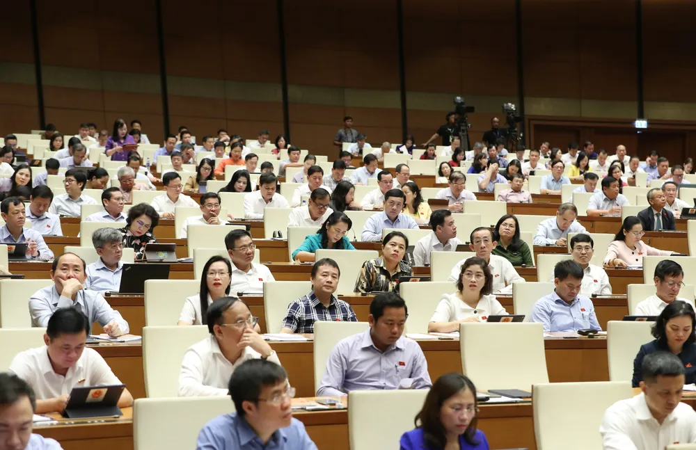 Đại biểu Quốc hội dự phiên thảo luận tại hội trường ngày 21-6. Ảnh: QUANG PHÚC Đại biểu Quốc hội dự phiên thảo luận tại hội trường ngày 21-6. Ảnh: QUANG PHÚC