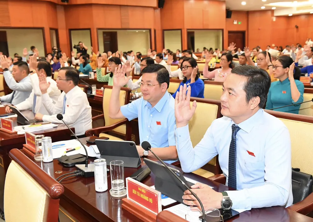 Đại biểu HĐND TPHCM thông qua chương trình kỳ họp. Ảnh: VIỆT DŨNG Đại biểu HĐND TPHCM thông qua chương trình kỳ họp. Ảnh: VIỆT DŨNG