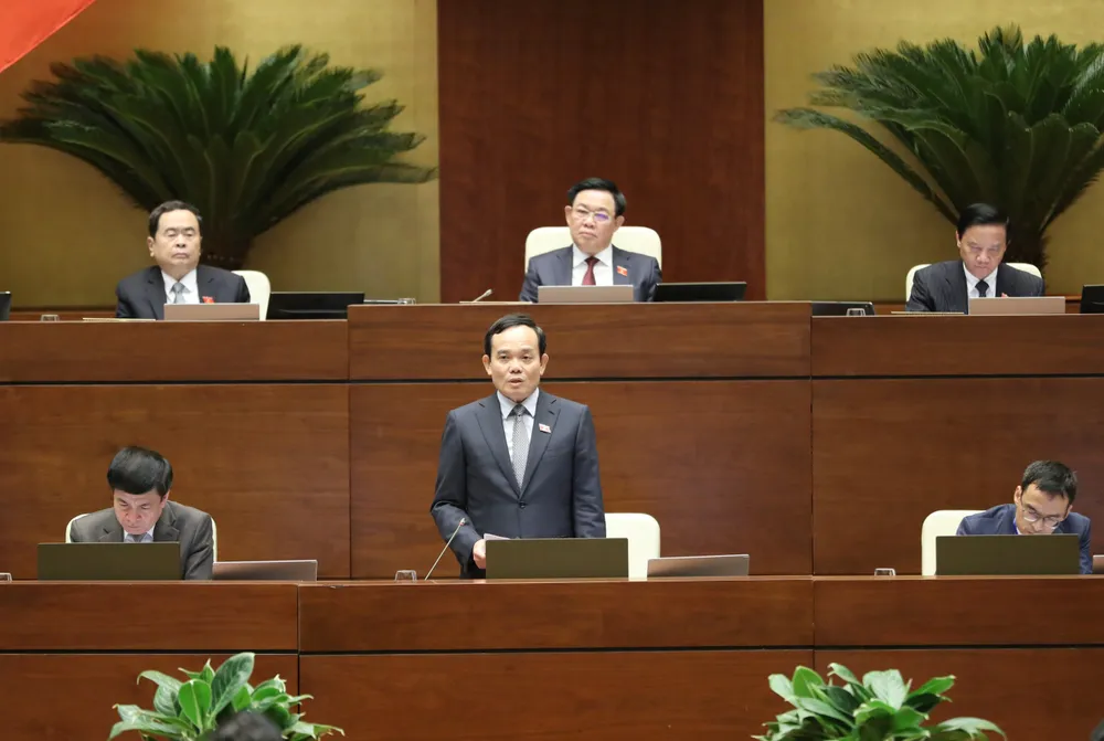 Phó Thủ tướng Trần Lưu Quang giải trình trước Quốc hội. Ảnh: QUANG PHÚC