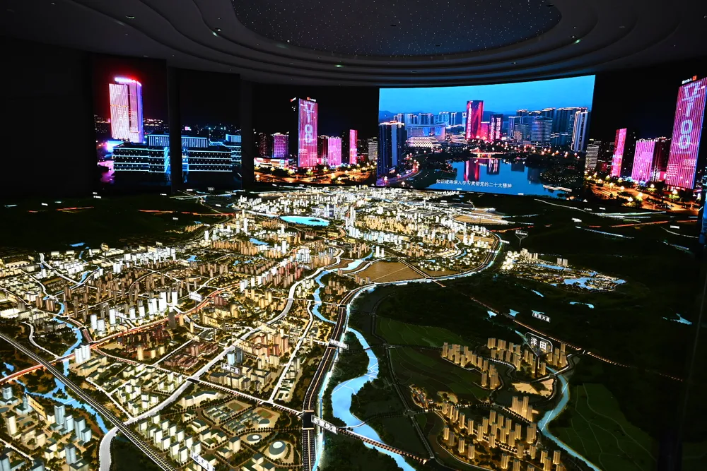 Mô hình quy hoạch phát triển Thành phố Tri thức Quảng Châu. Ảnh: VĂN MINH Mô hình quy hoạch phát triển Thành phố Tri thức Quảng Châu. Ảnh: VĂN MINH