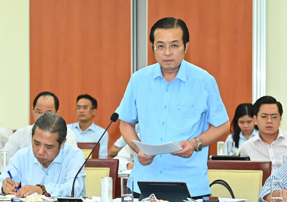 Bí thư Quận ủy quận 10 Lê Văn Minh phát biểu. Ảnh: VIỆT DŨNG d75f9a120d18b946e009.jpg