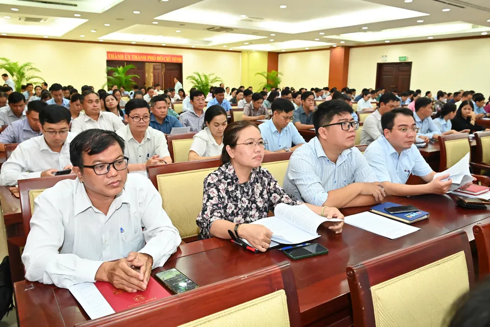 Đại biểu dự hội nghị tại điểm cầu TPHCM. Ảnh: VIỆT DŨNG 86e9d8eb8bd03c8e65c1.jpg