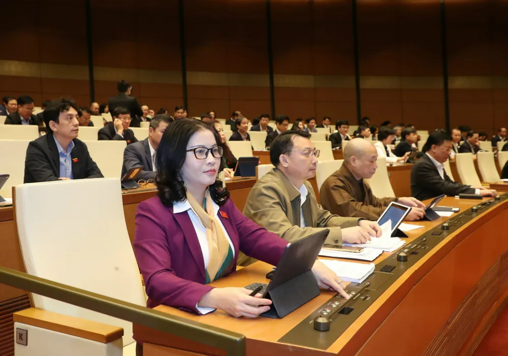 Đại biểu Quốc hội bấm nút thông qua nghị quyết Đại biểu Quốc hội bấm nút thông qua nghị quyết