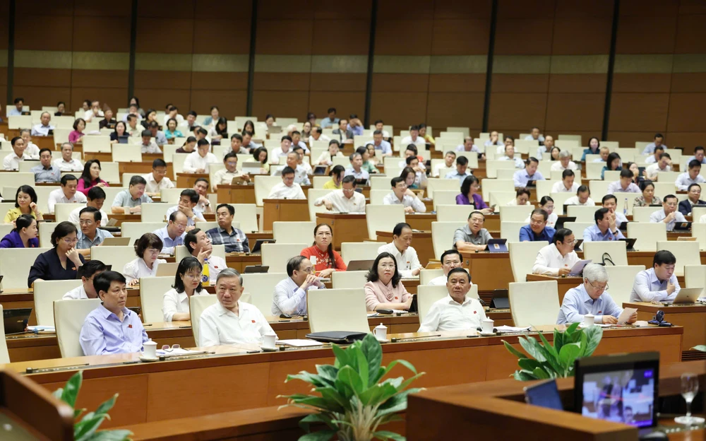 Tổng Bí thư Tô Lâm, Chủ tịch nước Lương Cường và các đại biểu dự phiên họp, sáng 14-5. Ảnh: QUANG PHÚC LĐ dự 14a.jpeg