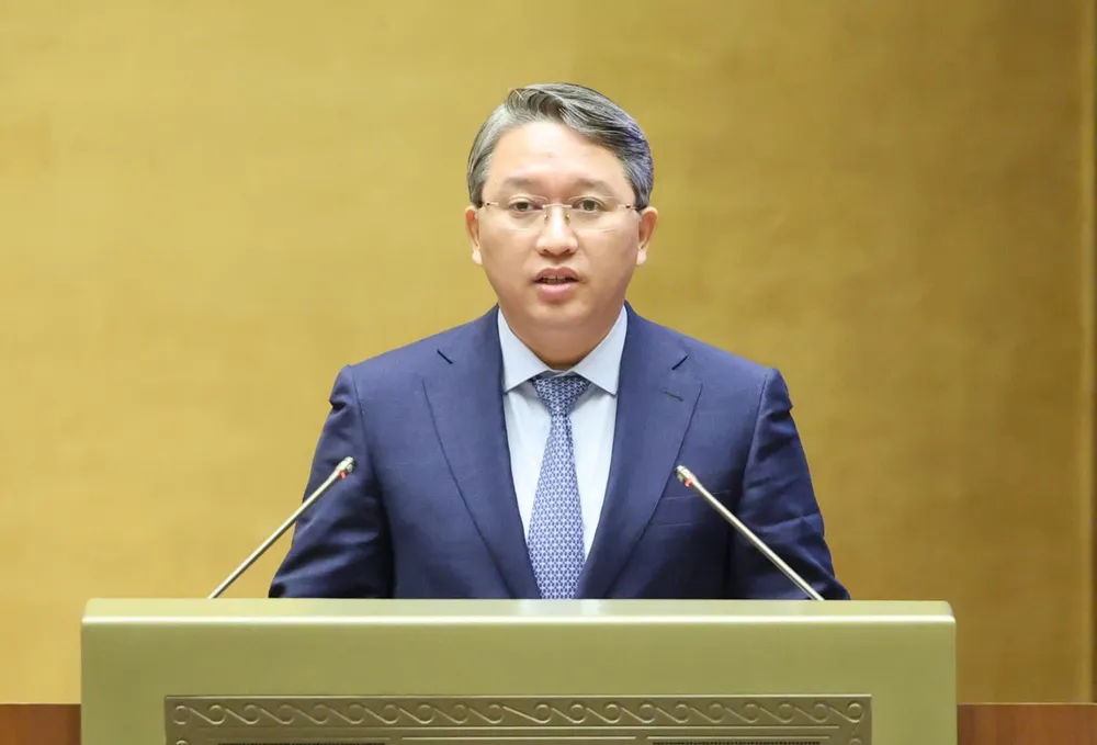 Bộ trưởng Bộ Tư pháp Nguyễn Hải Ninh trình bày báo cáo về công tác thi hành án năm 2025, sáng 9-12. Ảnh: QUANG PHÚC