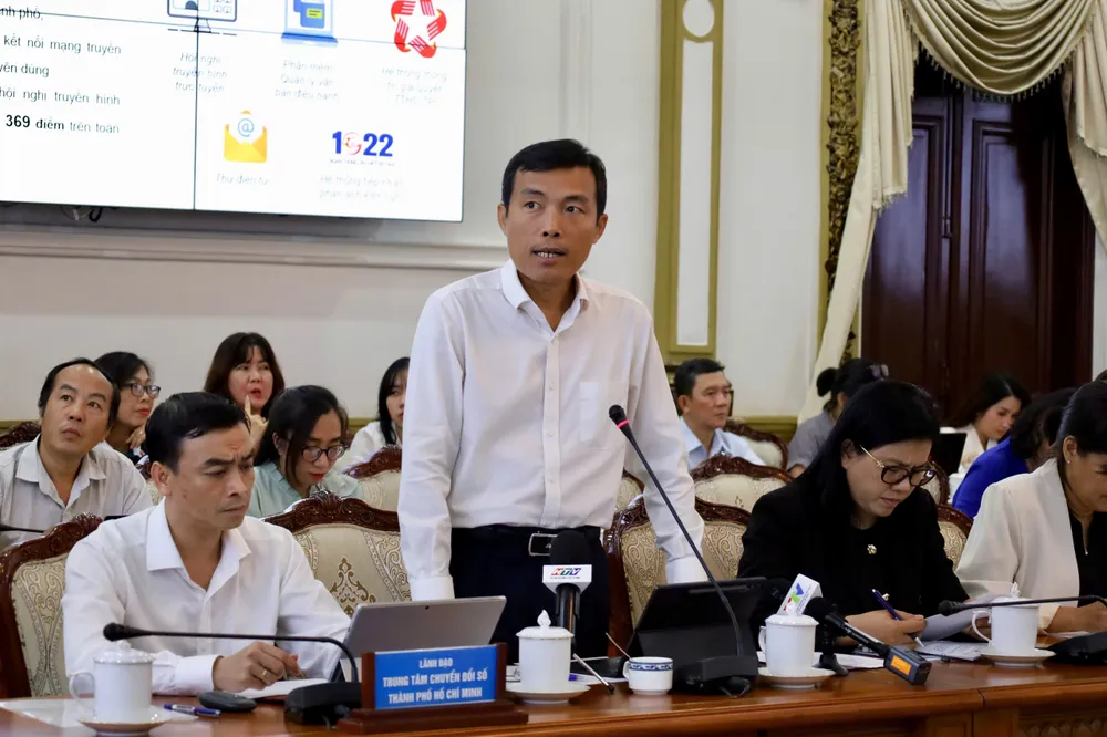 Đồng chí Võ Minh Thành, Phó Giám đốc Sở Khoa học và Công nghệ TPHCM báo cáo tại hội nghị. Ảnh: CẨM NƯƠNG 75712c3e8351090f5040 (1).jpg