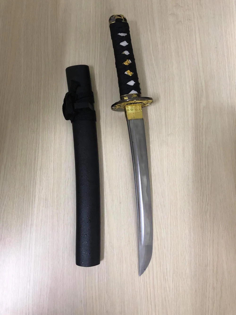  Người phụ nữ dùng kiếm chém 2 vợ chồng trước tiệm vàng ở quận 1 ảnh 2