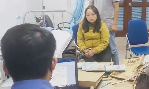 Hạnh cùng tang vật tại cơ quan chức năng