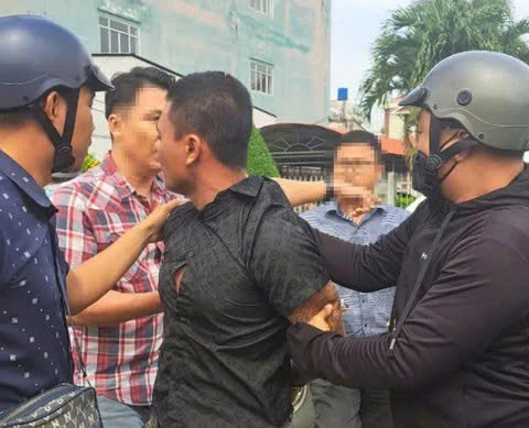 Lê Thanh Hiền lúc bị trinh sát khống chế z6055389763688_78ae5cf89e10c5bf70c457c468515cc1.jpg