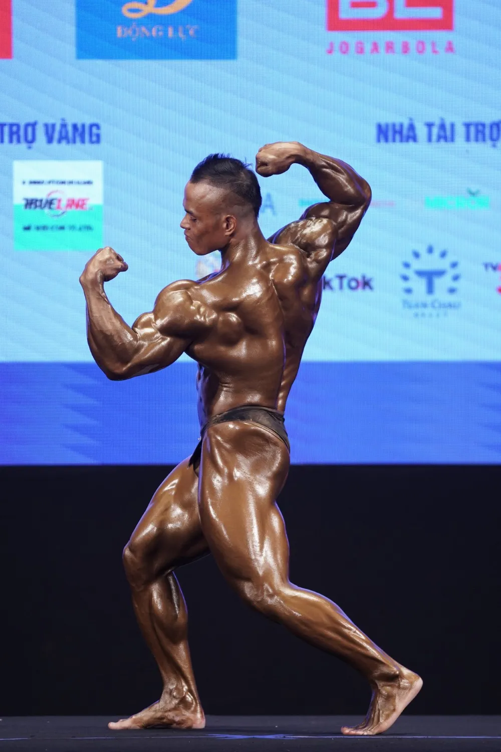 Thân hình cuồn cuộn của lực sĩ Trần Hoàng Duy Thuận vừa giành huy chương vàng ảnh 5 Thân hình cuồn cuộn của lực sĩ Trần Hoàng Duy Thuận vừa giành huy chương vàng ảnh 5
