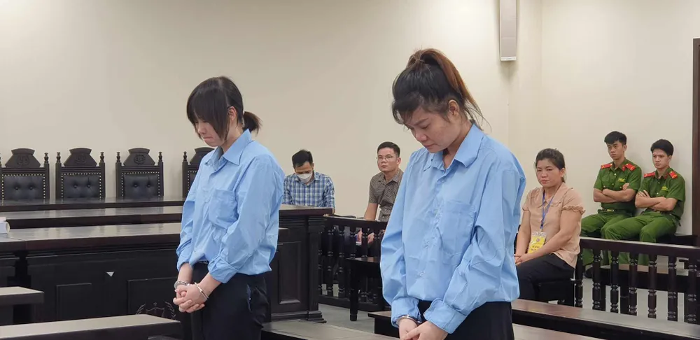 Hai bị cáo tại phiên tòa