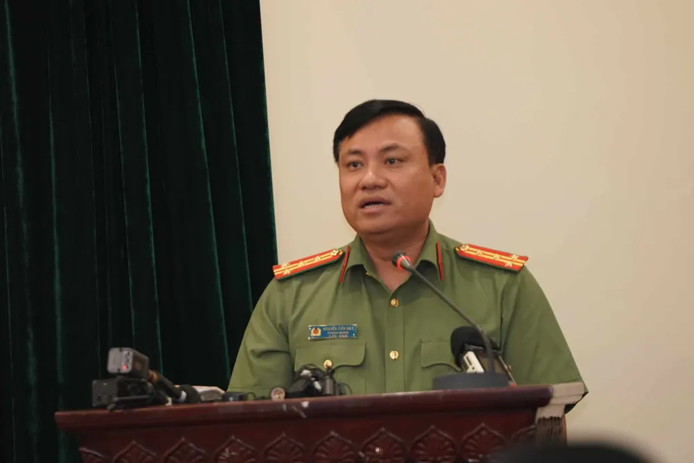 Đại diện Công an TP Hà Nội thông tin về vụ án. Ảnh: ĐỖ TRUNG