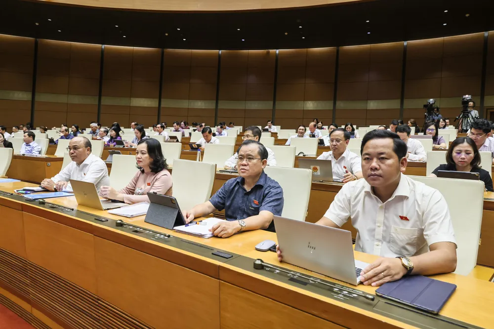 Các đại biểu trong phiên họp sáng 20-5. Ảnh: QUANG PHÚC z6619270430818_c2121c5253802b31c7561080b0dd1acf.jpg