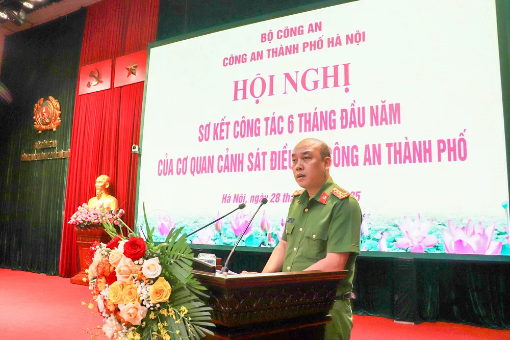 Đại tá Nguyễn Đức Long, Phó Giám đốc Công an TP Hà Nội phát biểu tại hội nghị. Ảnh: CÔNG AN HÀ NỘI Đại tá Long.jpg