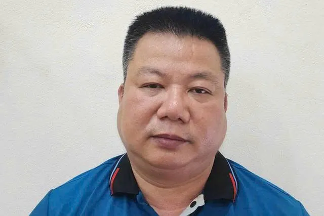 Bùi Trường Sơn tại cơ quan công an rut chia khoa.jpg