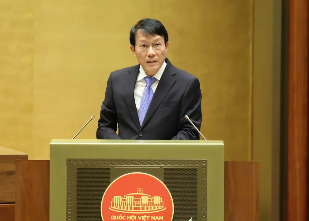 Bộ trưởng Bộ Công an Lương Tam Quang trình Quốc hội các dự án luật. Ảnh: QUANG PHÚC z7173238291635_e82c20556c395319353be3a76c240f4a.jpg