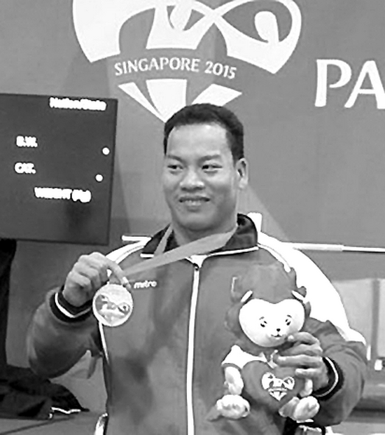 殘疾人運動員黎文功。