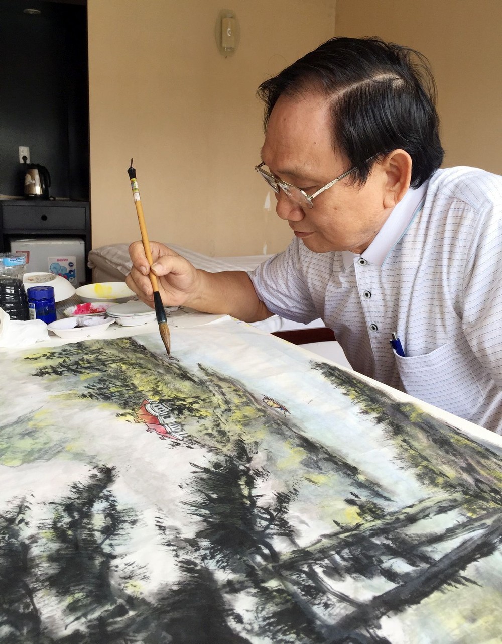 為教育和畫藝鞠躬盡瘁 ảnh 1