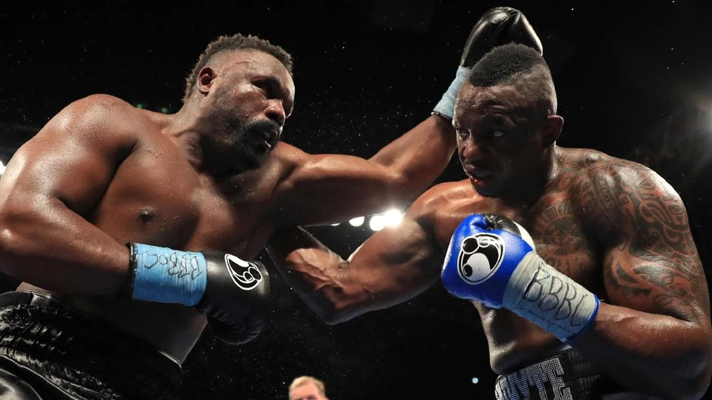 Whyte (phải) đấu với Chisora hồi năm 2016