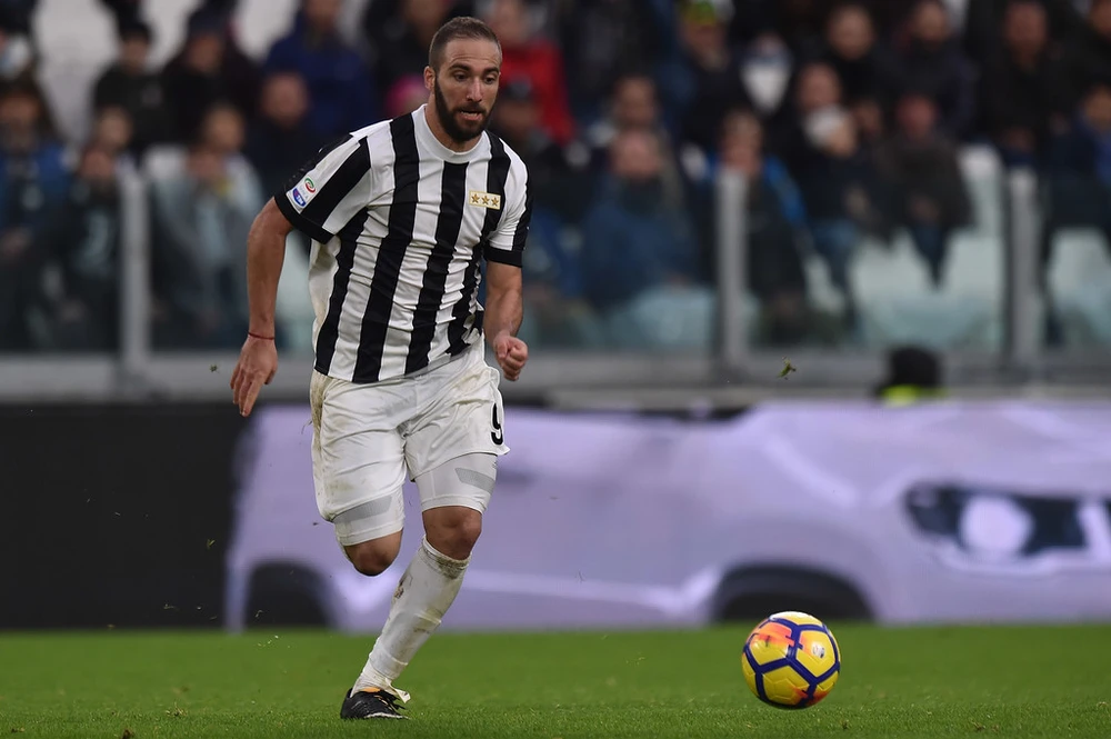 Tiền đạo Gonzalo Higuain sẽ av81ng mặt trận gặp Napoli. Ảnh Getty Images.