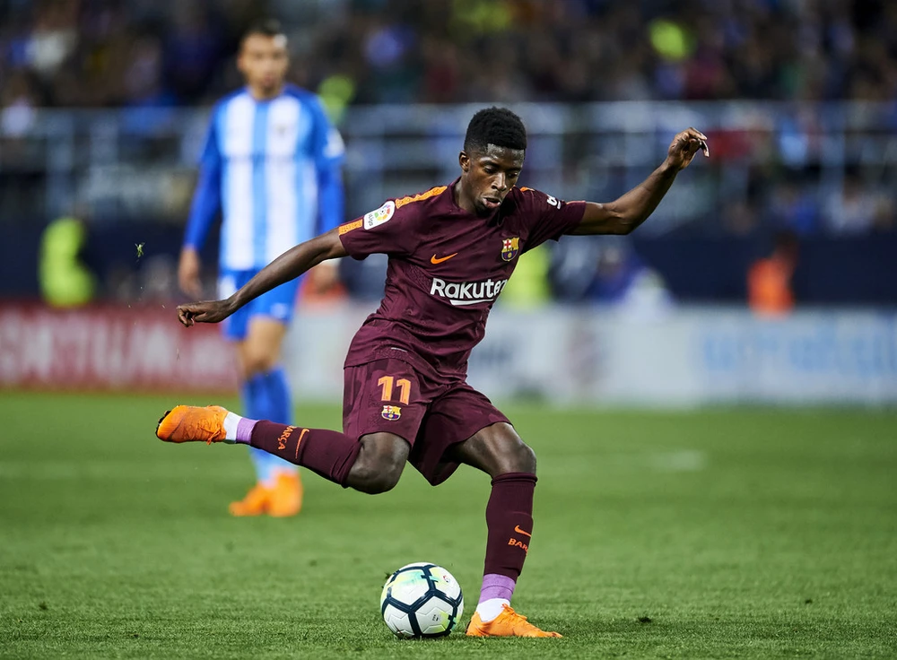 Ousmane Dembele tỏa sáng trong trận thắng Malaga. Ảnh: Getty Images.