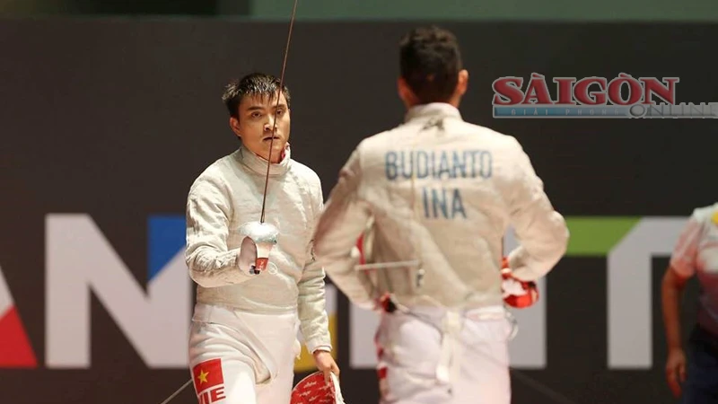 Thành An (trái) bảo vệ thành công HCV tại SEA Games. Tác giả: ĐÔNG HUYỀN